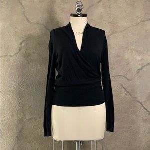 Black plunge sweater